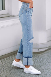 ASYMMETRIC BUTTON ZIP DENIM JEANS