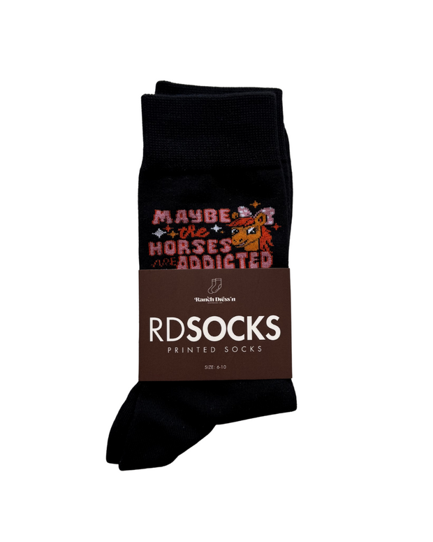 MAYBE THE HORSES ARE ADDICTED TO ME SOCKS